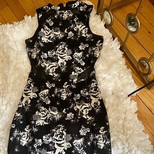 Beautiful and Classy BodyCon Dress with Sheer cutouts.